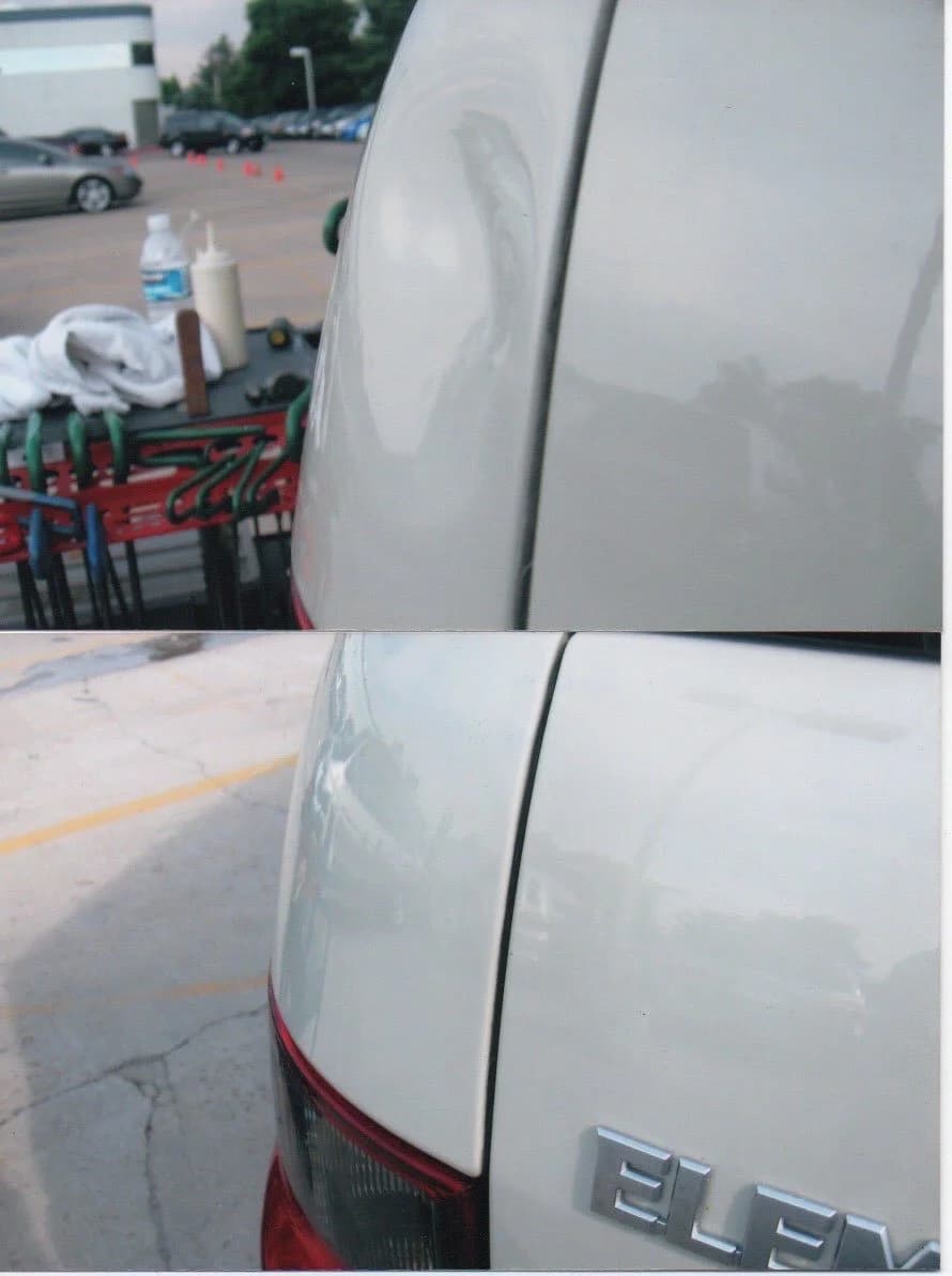 Side view of a white car after repair.